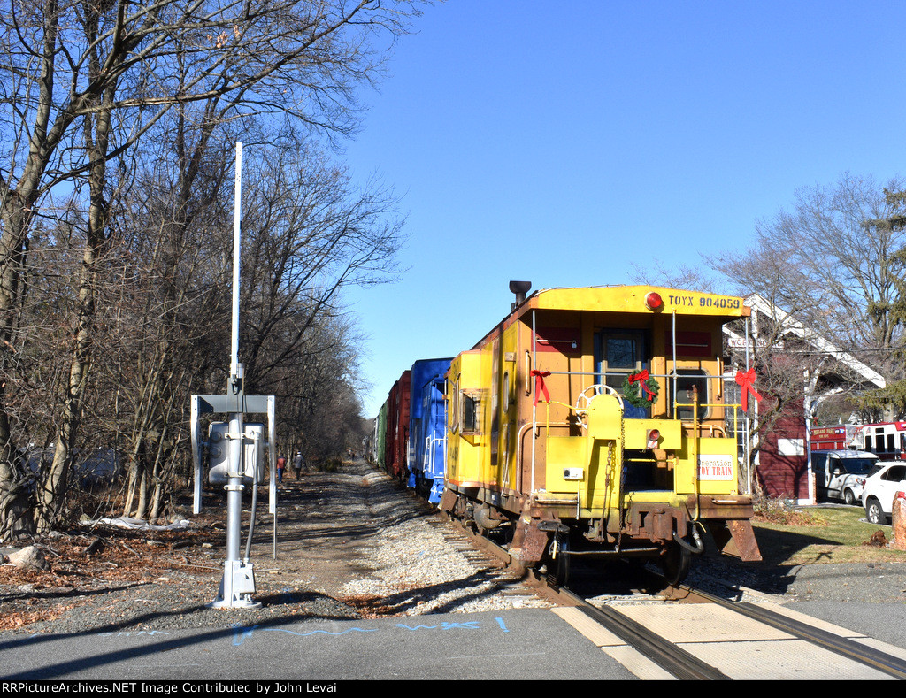 Conrail and Chessie System Cabooses on the rear of the Susquehanna TFT train while it is stopped at Wortendyke depot